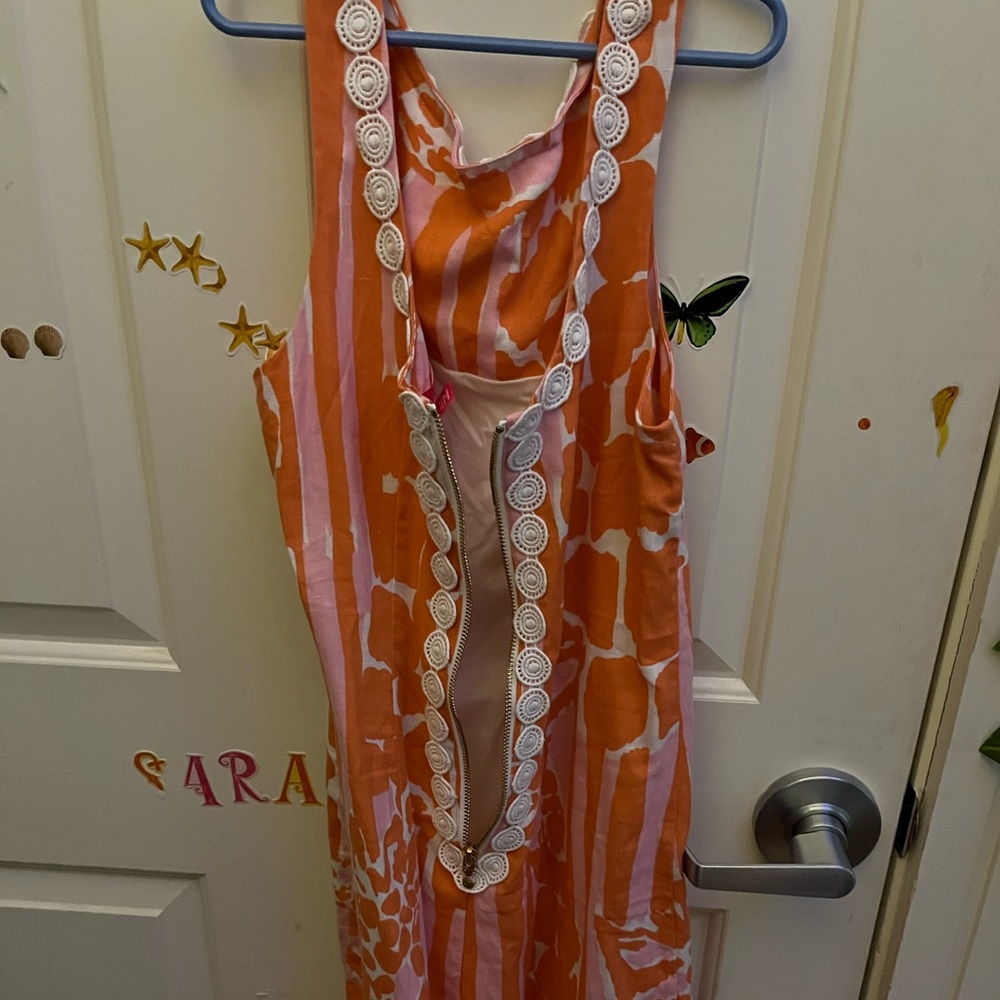 Beautiful dress, worn twice. Length is above the knees. Very comfy